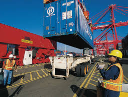 Loading a container full of Italian pottery on a truck