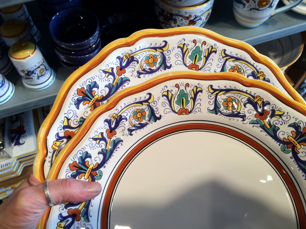 When comparing the two plates, you can see the design is identical - even the "mistakes" are uniform from plate to plate. The edges are hand painted to emulate an entirely hand painted piece. 