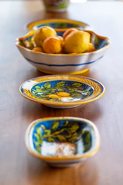 Limone: Italian Pottery from Umbria featuring lemon patterns.