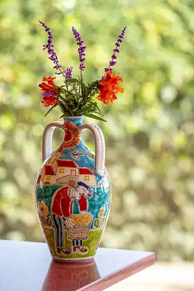 Hand-painted Italian ceramic vases.